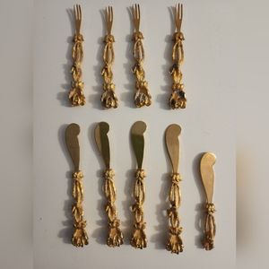 Vintage Janis 24K gold plated forks and spreaders.Set includes 11 pieces total